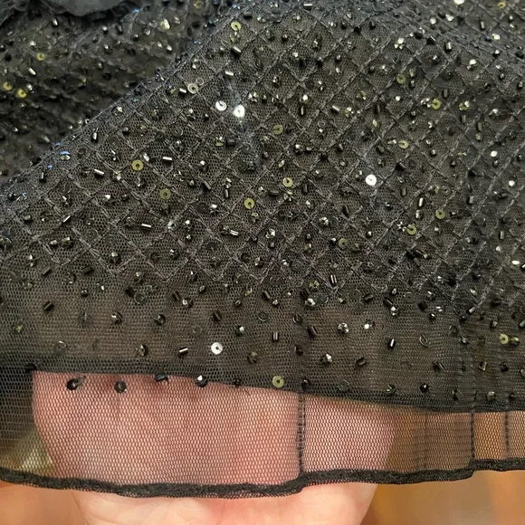 Chic Black Midi Skirt with Embellished Hem
